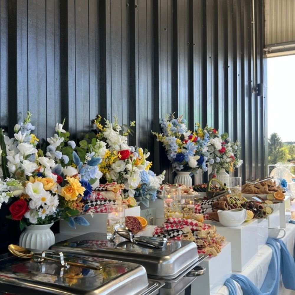 two glasses and flowers displayed