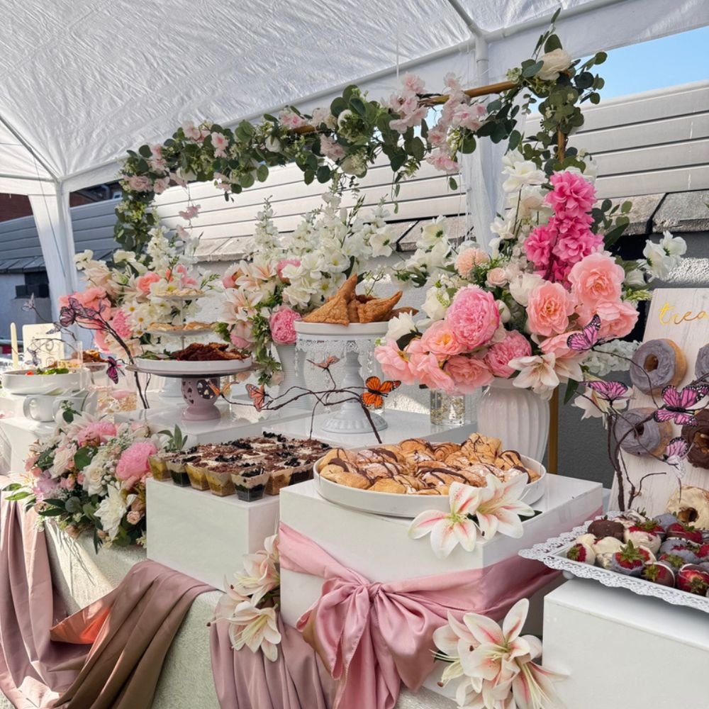 wedding table display strawberries red and white flowers 